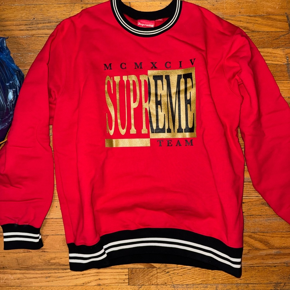 Supreme Red Crewneck Sweatshirt with Gold Logo